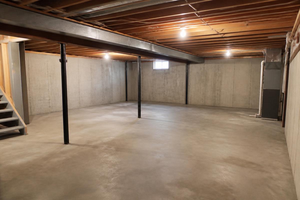 Same basement completely empty and swept after junk removal in Kings Mountain, NC